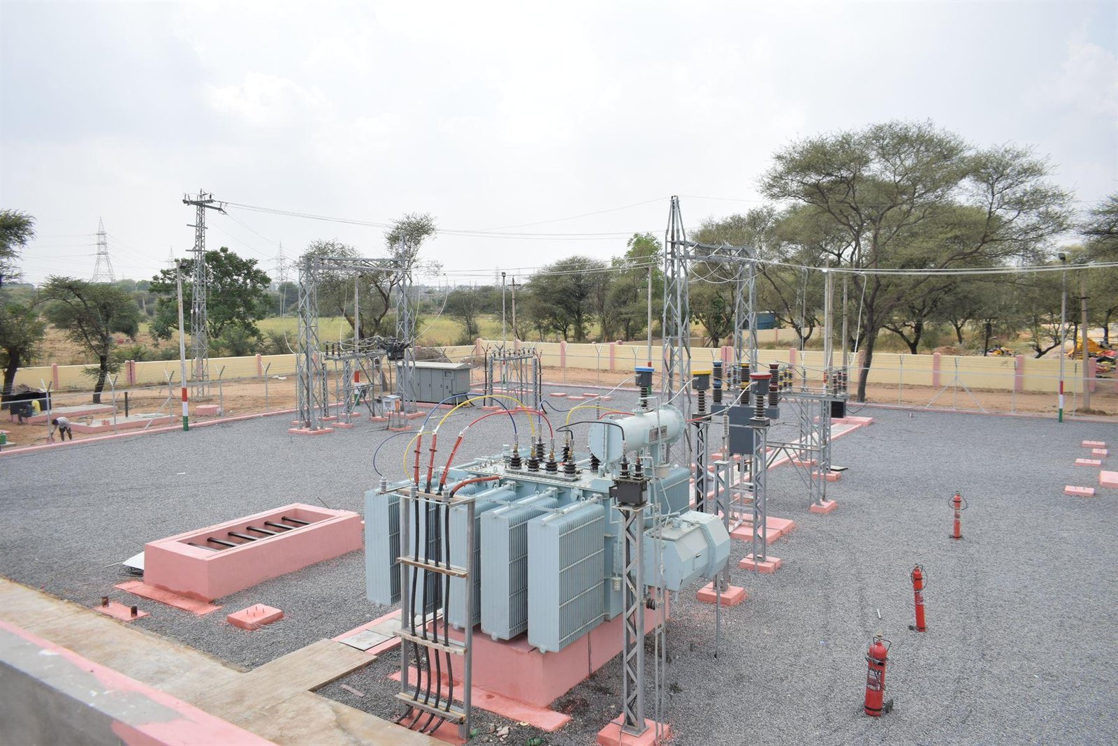 Power transformer and gantries at a commissioned 33 kV substation